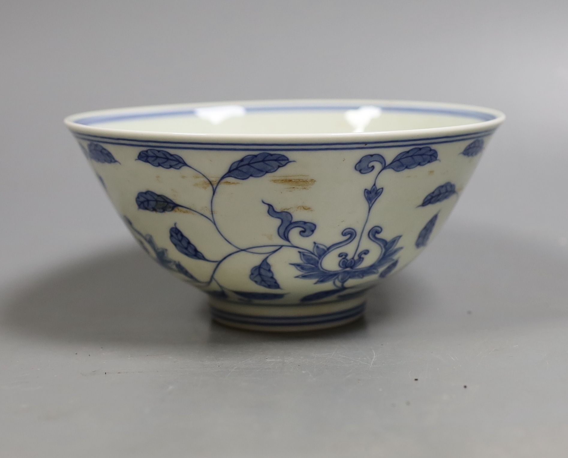 A Chinese blue and white bowl, 14 cms diameter.